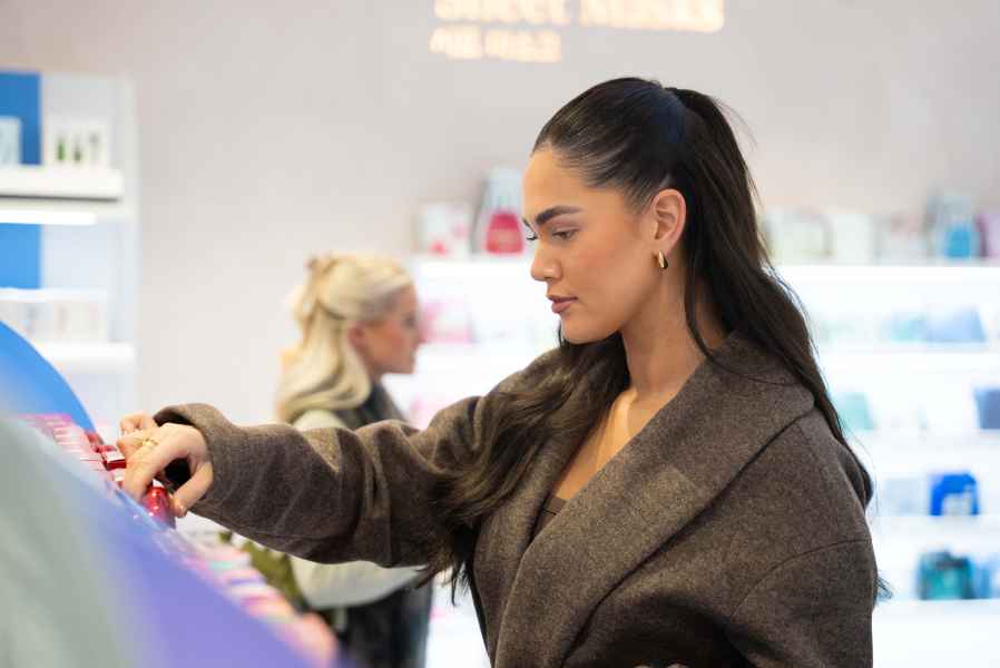 PURESEOUL Cardiff, customer browsing the finished K-beauty retail fit-out